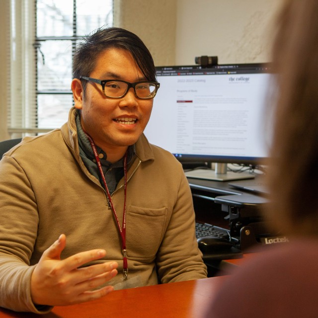 Adviser talking with a student 